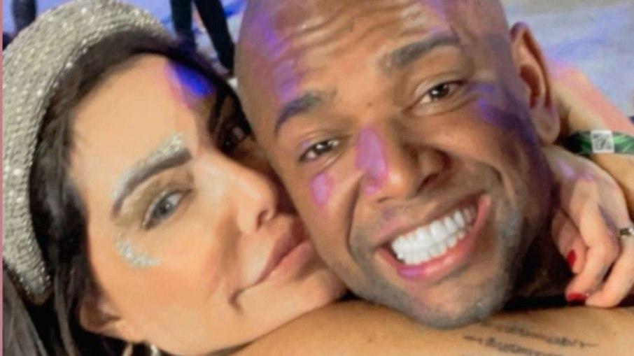 Liziane Gutierrez e Nego do Borel trocam beijos na Sapucaí